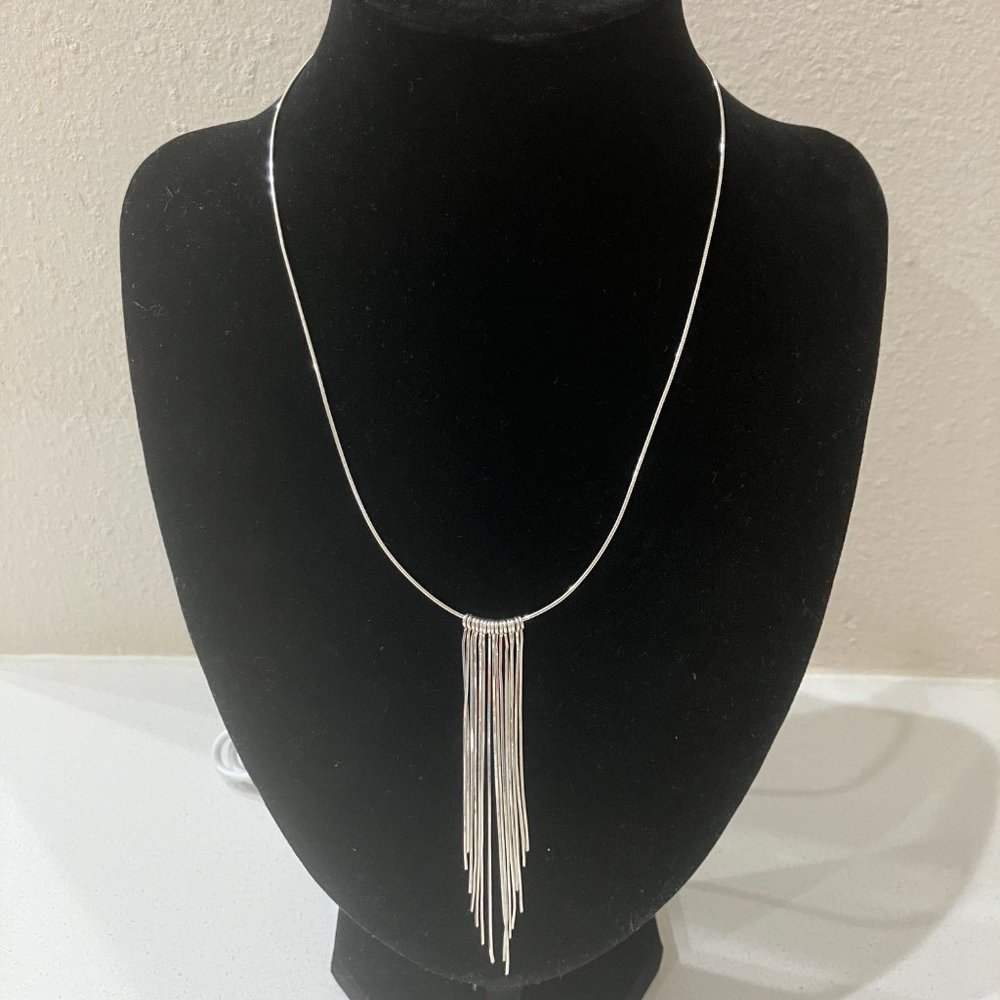 Silver necklace with tinsel-like strands